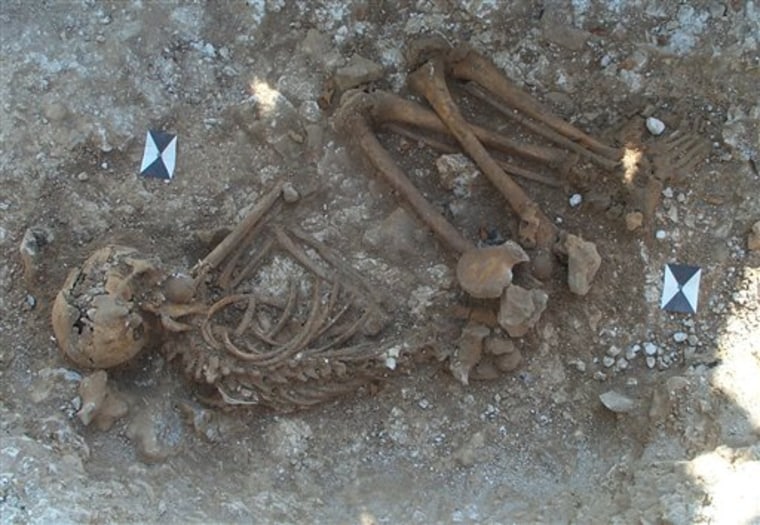This image shows the remains of an early bronze age burial. Although it cannot be seen in this photograph, this person was buried wearing a necklace made from amber beads. The body is in a flexed position, reminiscent of a sleeping pose. A wealthy young teenager buried near Britain's mysterious Stonehenge monument came from the Mediterranean, scientists say, proof of Stonehenge's international importance even in prehistoric times.